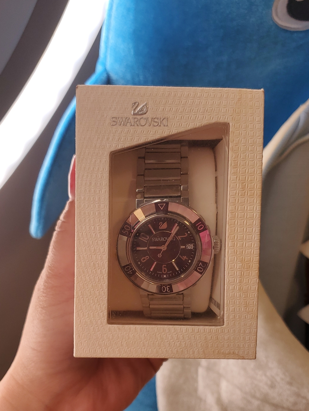 Swarovski Silver Watch with Purple Bezel